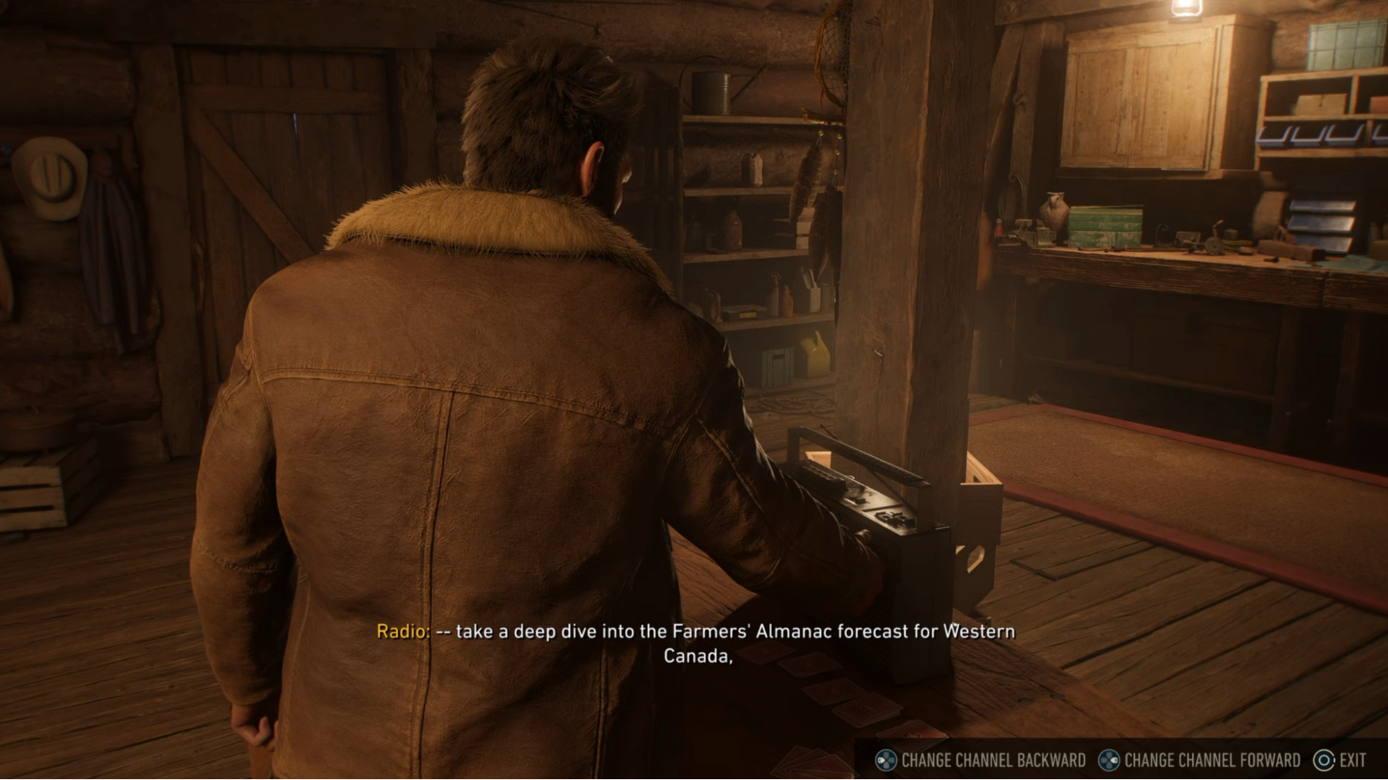 Logan listening to the radio in his cabin